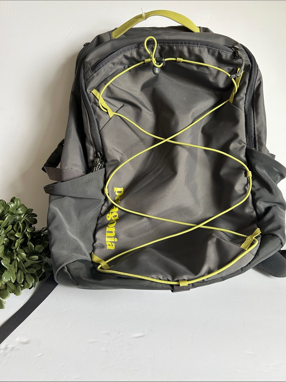 Patagonia Gray Backpack with Yellow Bungee Accents